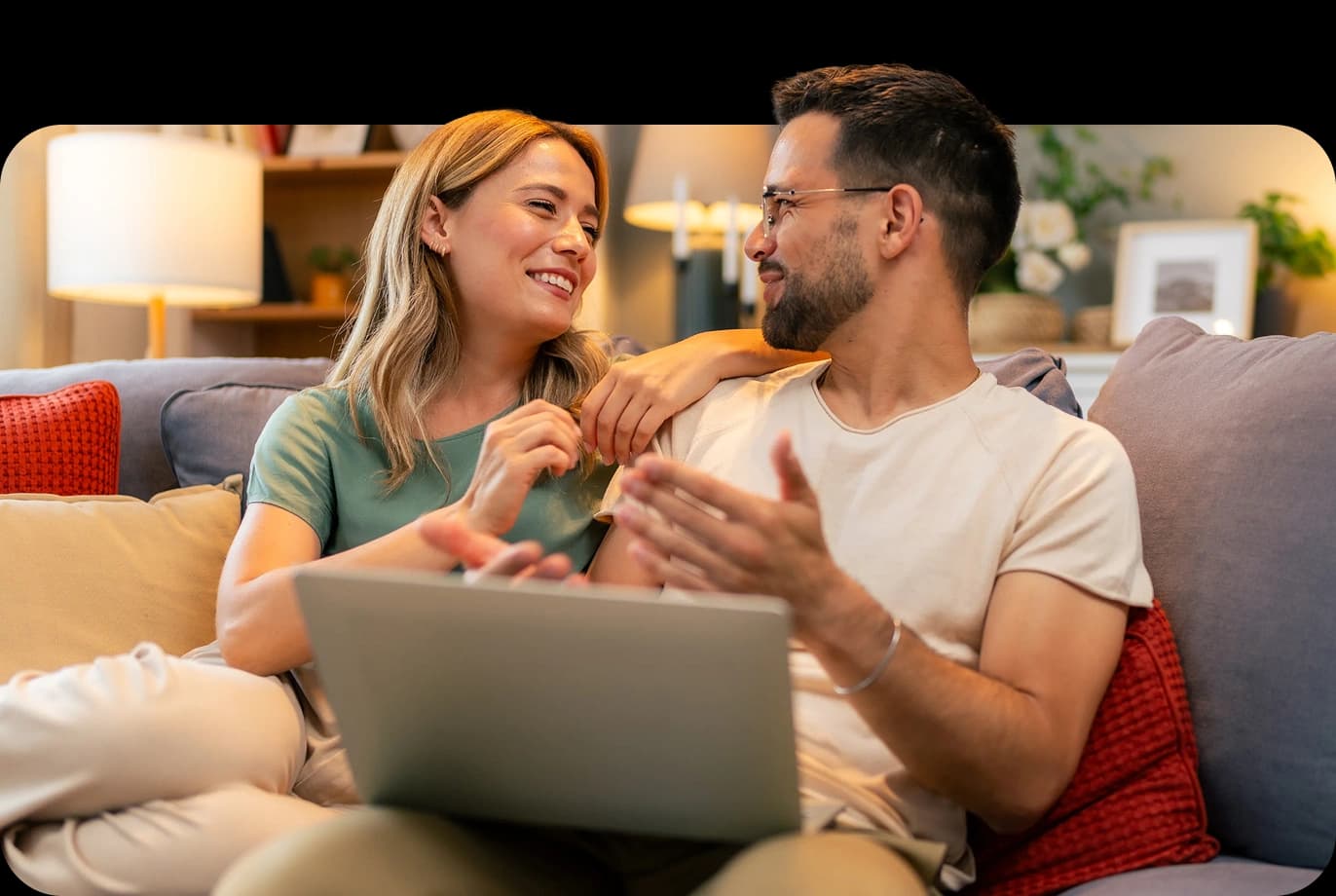 A New Yorker reviewing financial planning decisions with a NerdWallet Wealth Partners advisor