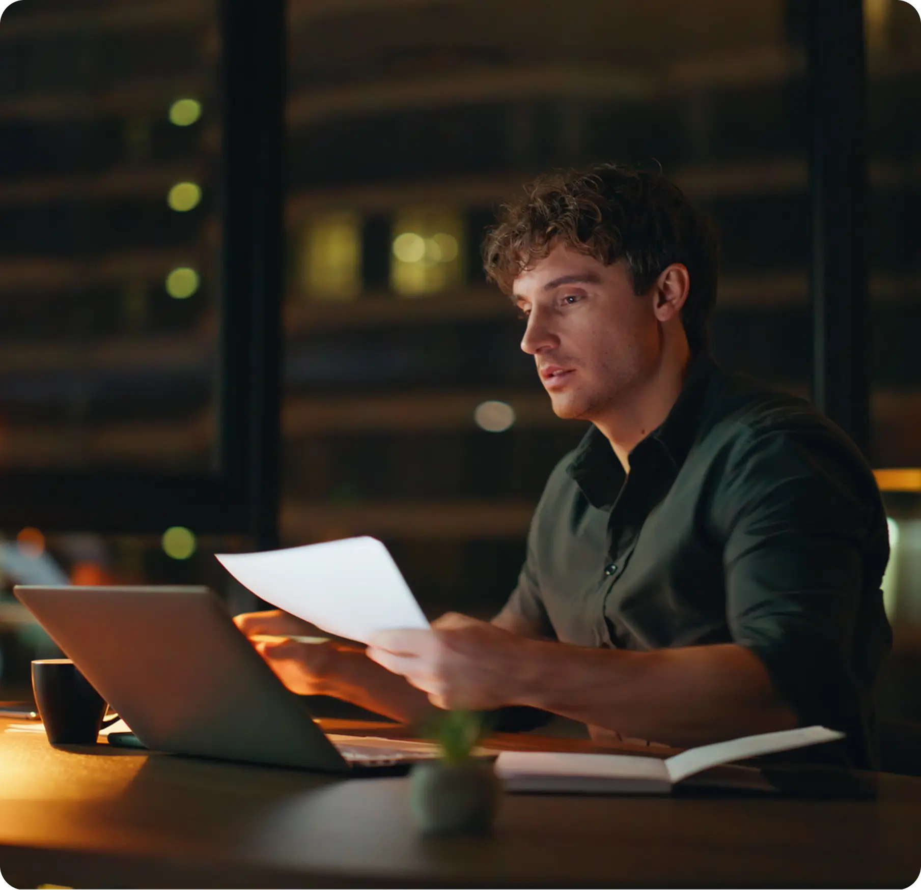 A tech professional reviewing equity compensation with a NerdWallet Wealth Partners advisor