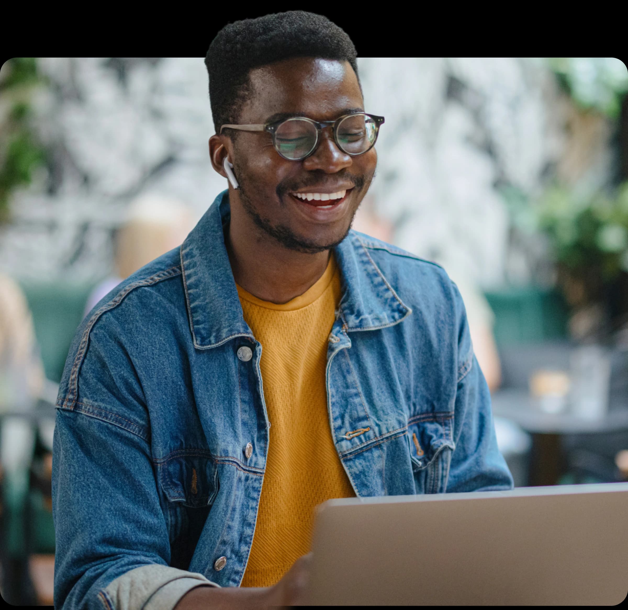 A tech professional reviewing equity compensation with a NerdWallet Wealth Partners advisor
