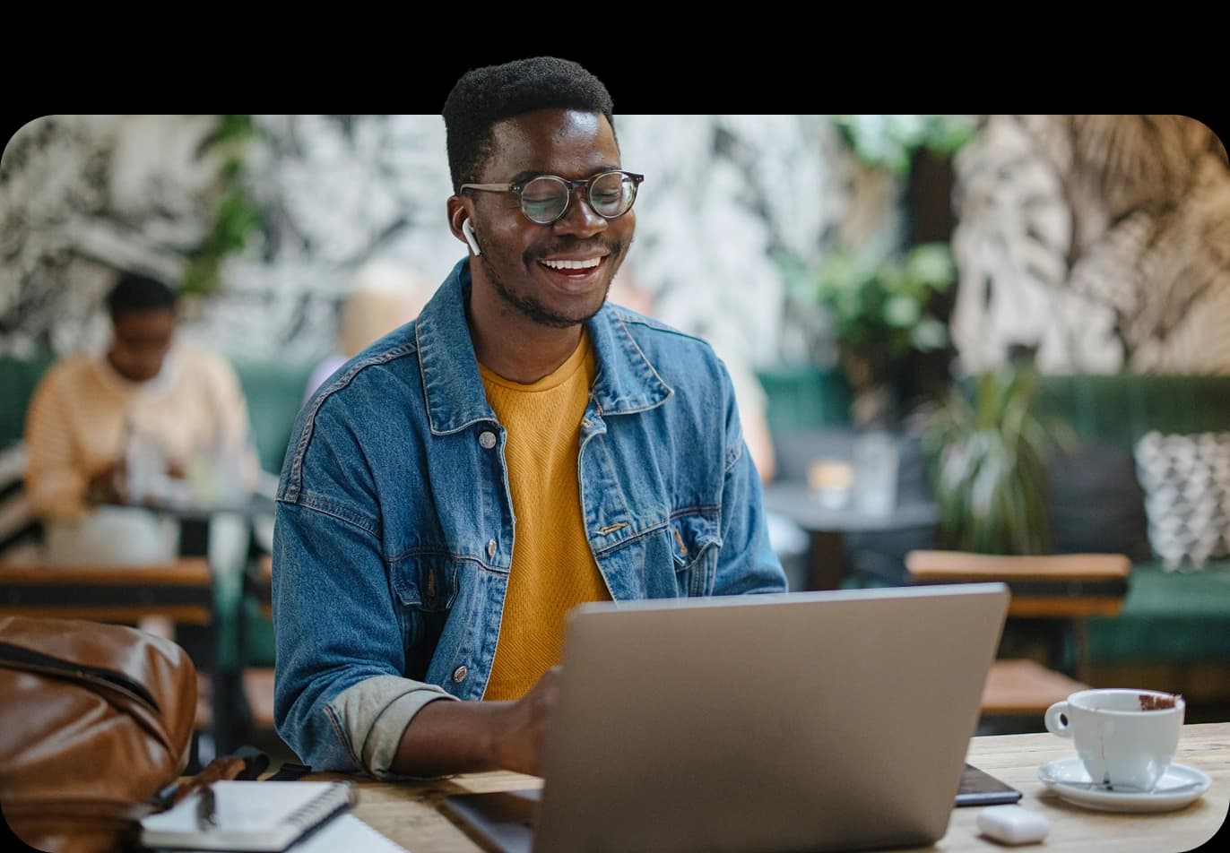 A tech professional reviewing equity compensation with a NerdWallet Wealth Partners advisor